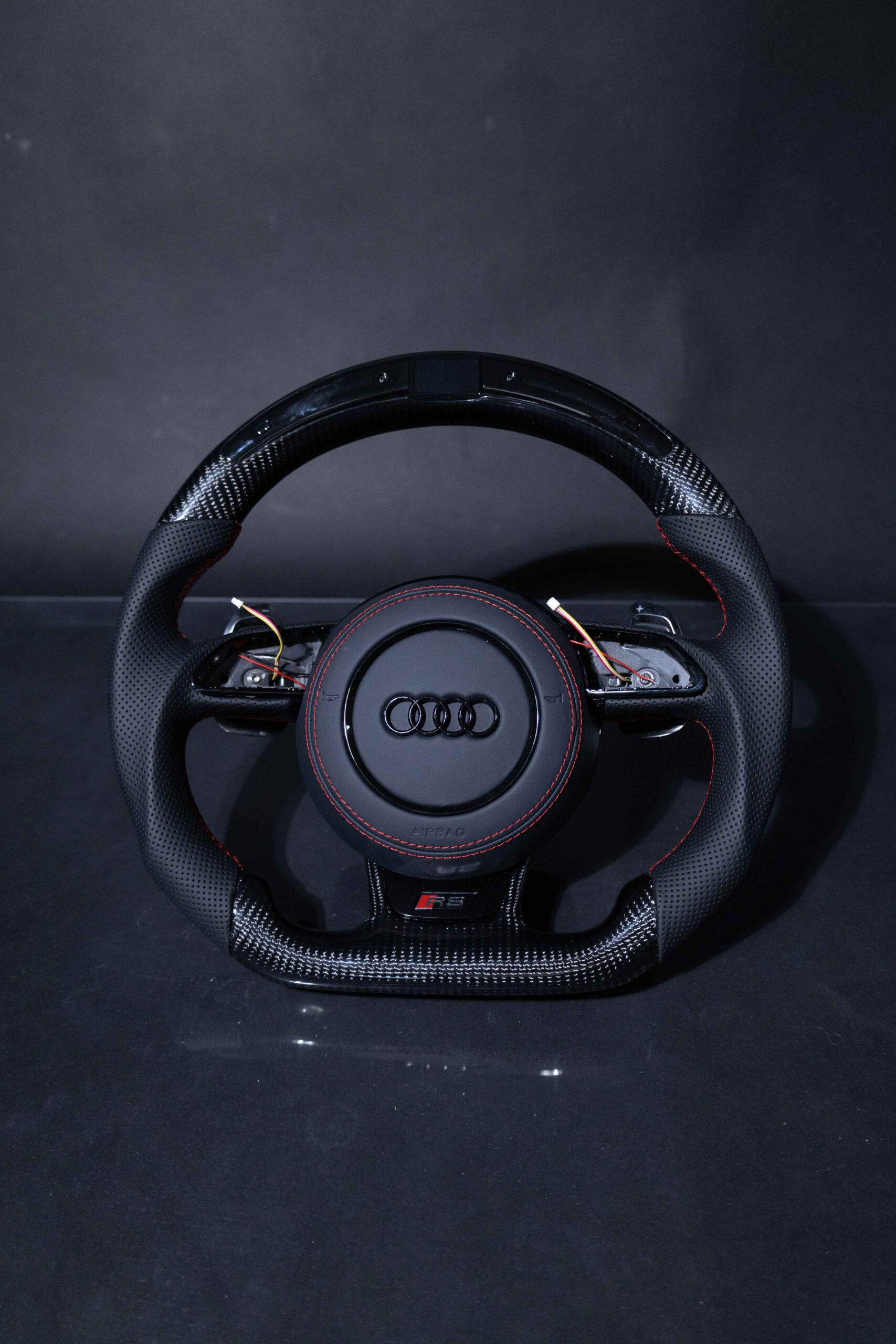 Volante Audi en fibra de carbono